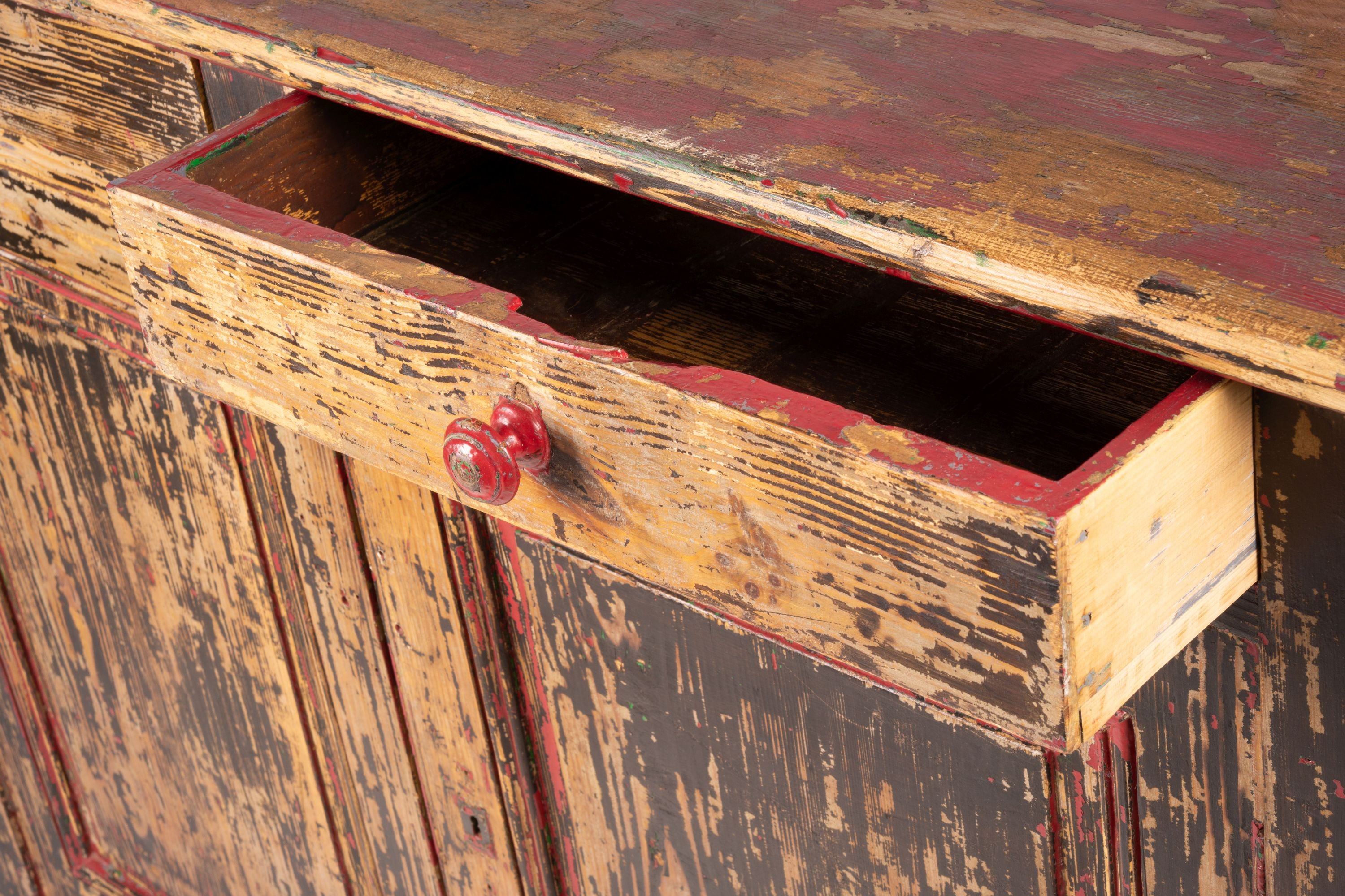 A 19th century French painted pine two door cabinet with scraped finish, width 140cm, depth 57cm, height 105cm